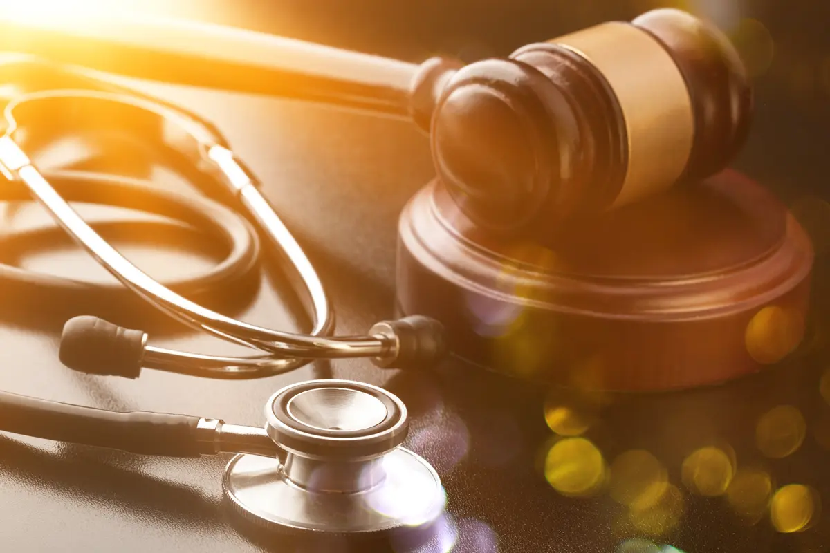 legislation image of a gavel and stethescope representing informed consent