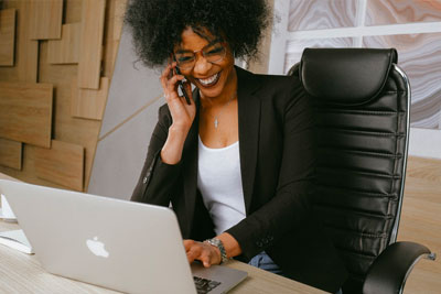 vaccine-exemptions-employees image of african american woman working on laptop