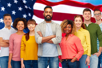 vaccine-exemptions-immigration image of immigrants in front of american flag