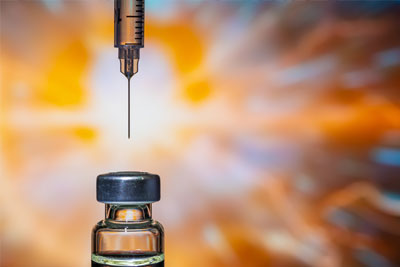 immigration-vaccine-waiver image of gavel in front of woman