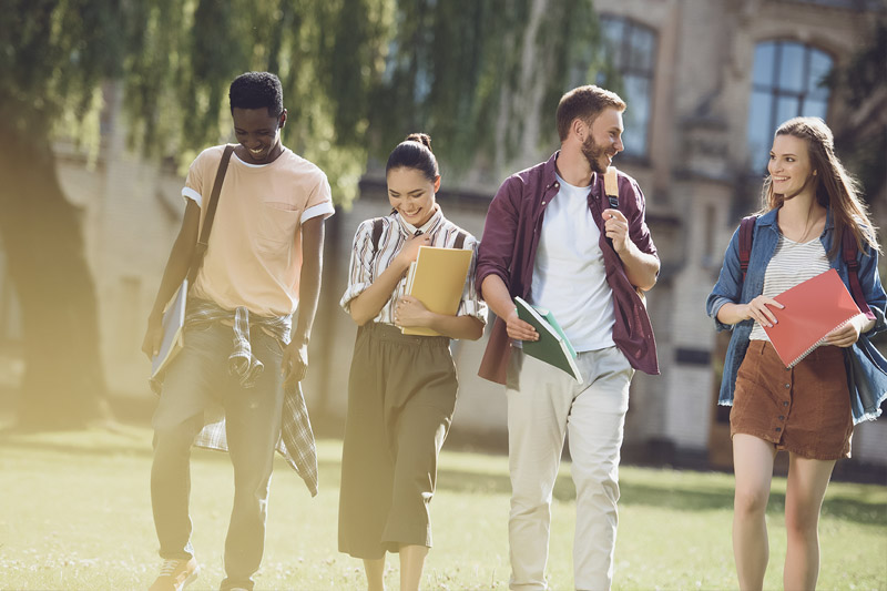 image of college students walking on campus