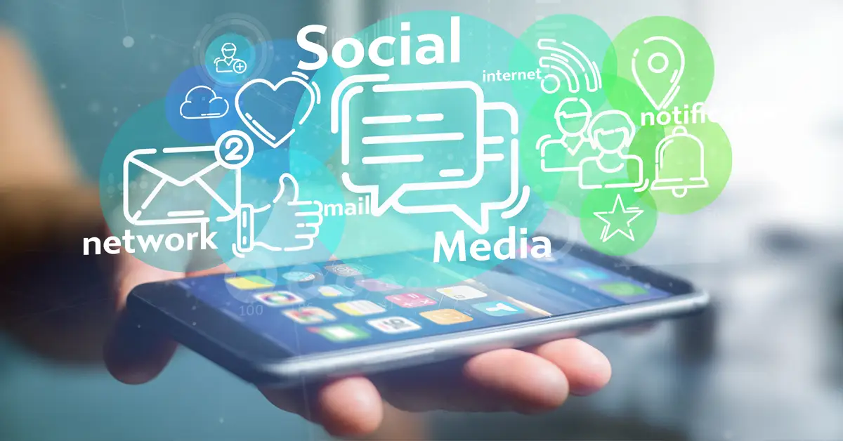 image of a cell phone with social media icons flowing out of it, representing social media and its effects on immigration