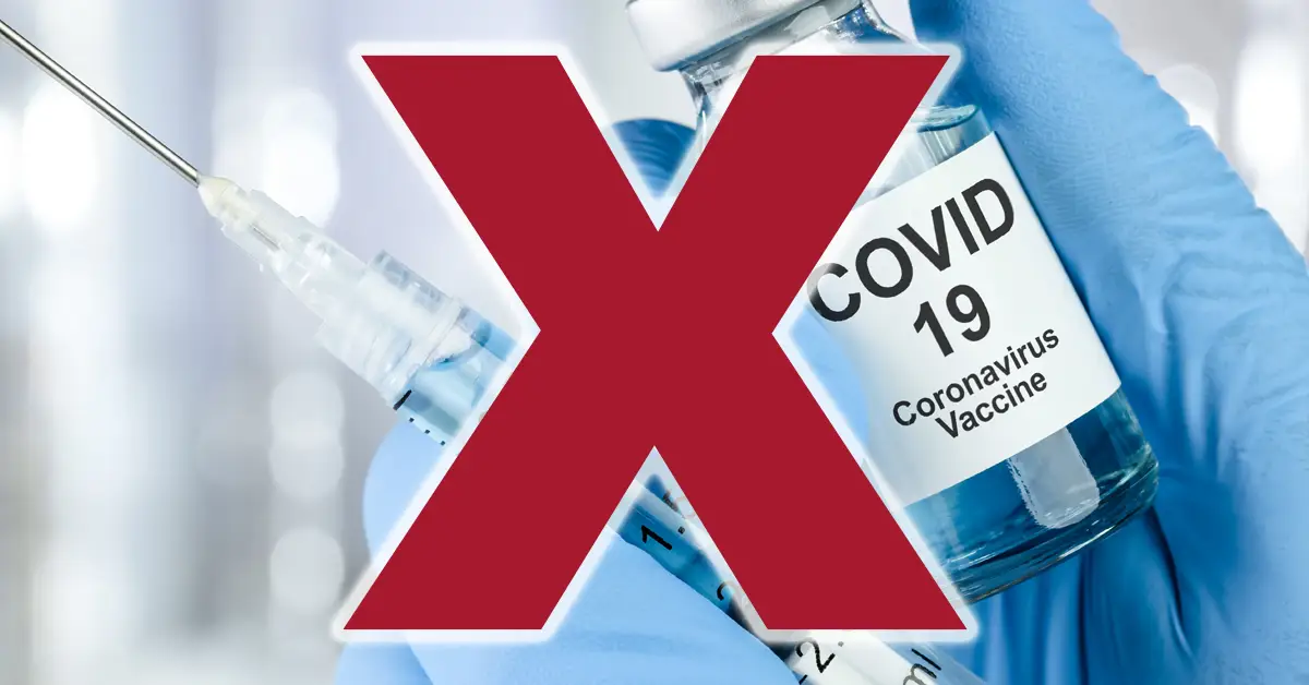 image of a covid-19 vaccine vial and syringe with a giant red x over it signaling USCIS eliminates the COVID-19 vaccine requirement