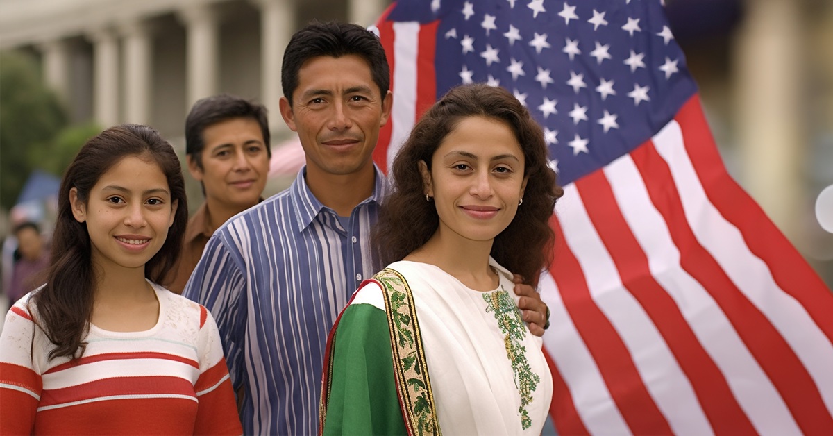 Immigrant family together in front of an American flag