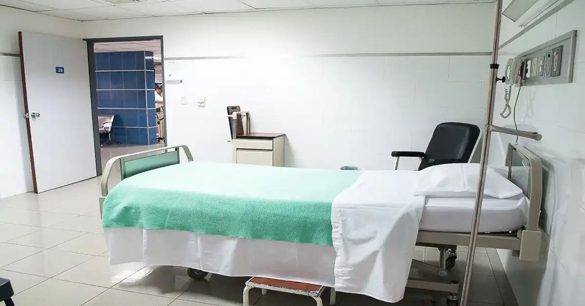 image of an empty hospital bed representing hosptial acquired infection