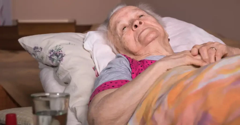 image of elderly woman in bed representing nursing home neglect