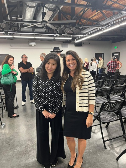 Immigration attorney Christina Xenides with a former immigration client after a successful vaccine waiver approval at Siri & Glimstad