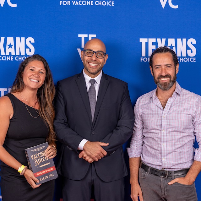Immigration attorney Christina Xenides at a vaccine law book signing event in Round Rock, Texas with Aaron Siri and her husband Oryan Inbar