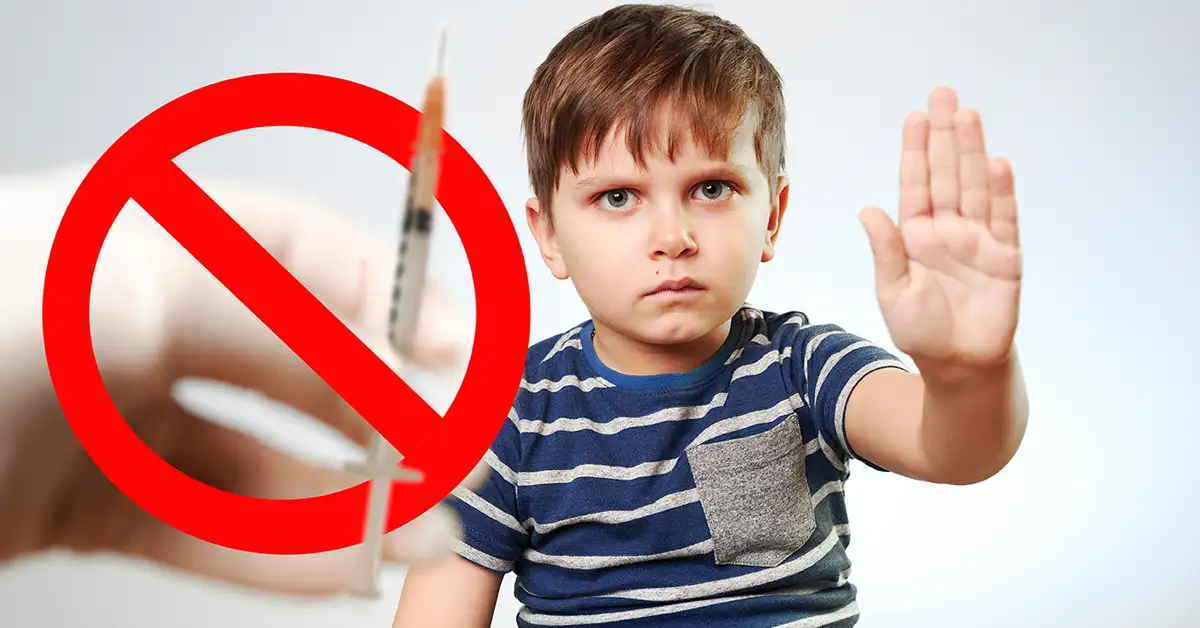 Child holding up hand next to “no syringe” symbol, school vaccine exemption help