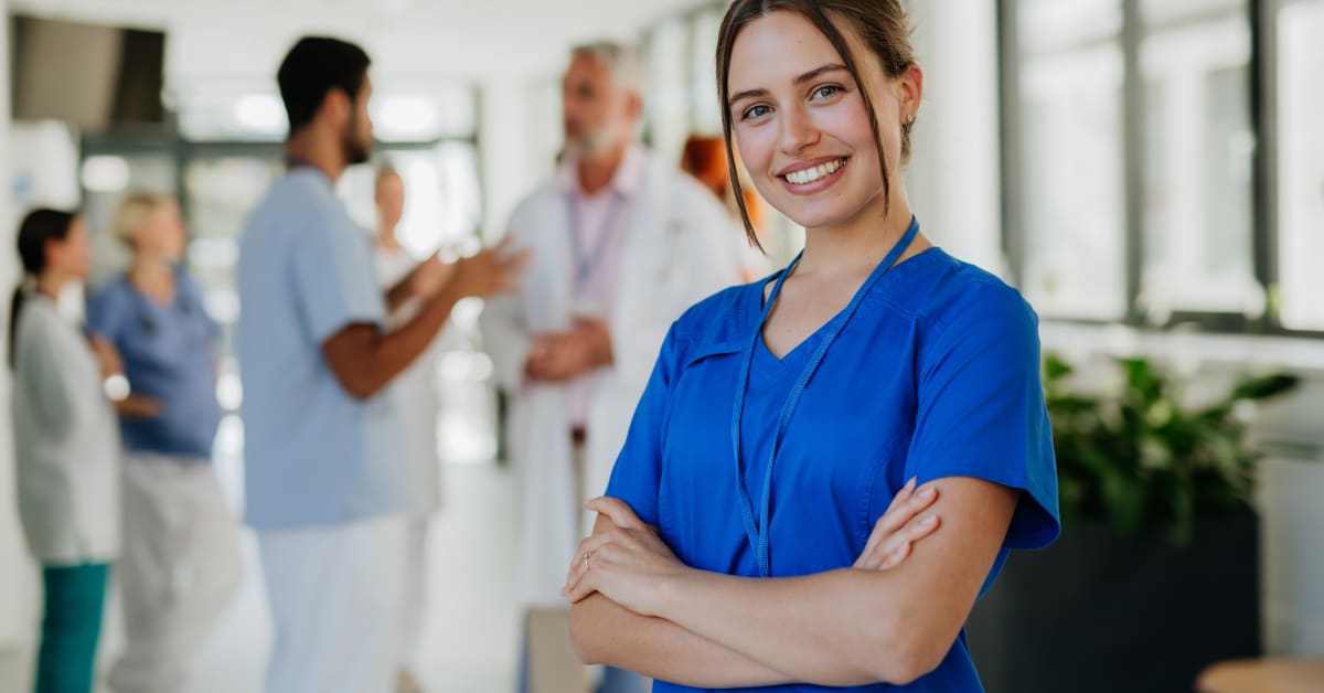 Nursing student in scrubs at hospital, clinical rotation vaccine exemption legal help