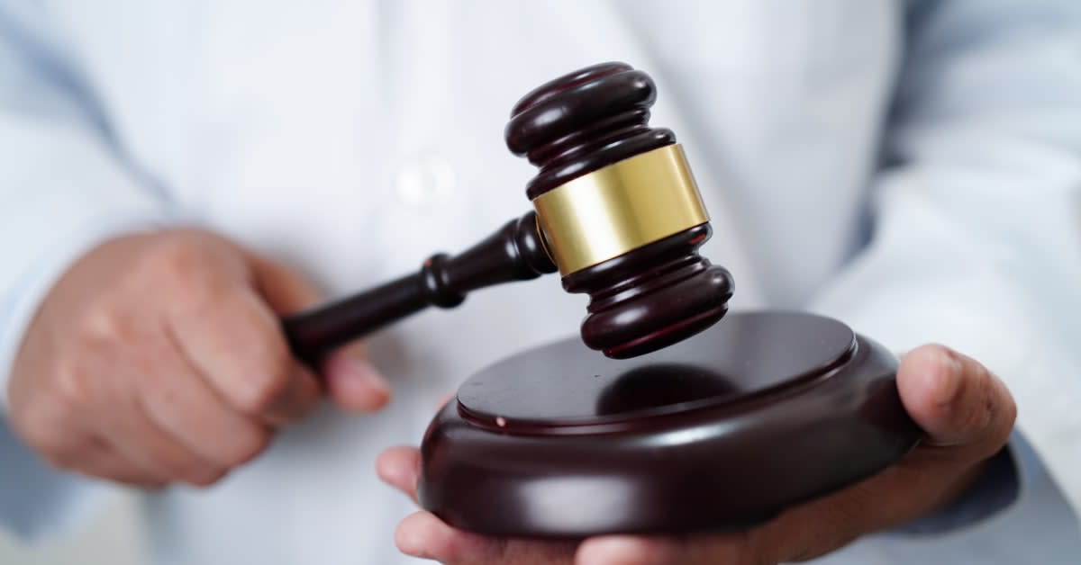 Close-up of a judge’s gavel, representing immigration-related legal matters handled by immigration attorneys.
