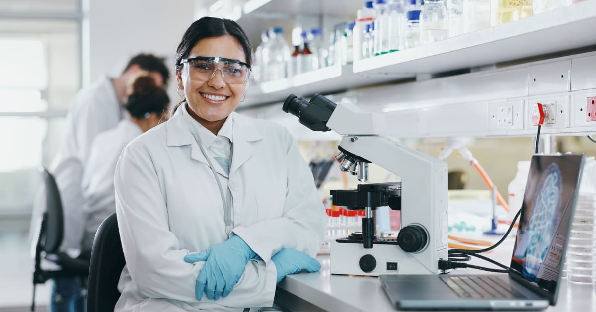 A scientist working with lab equipment, representing specialized employment immigration cases supported by immigration attorneys.