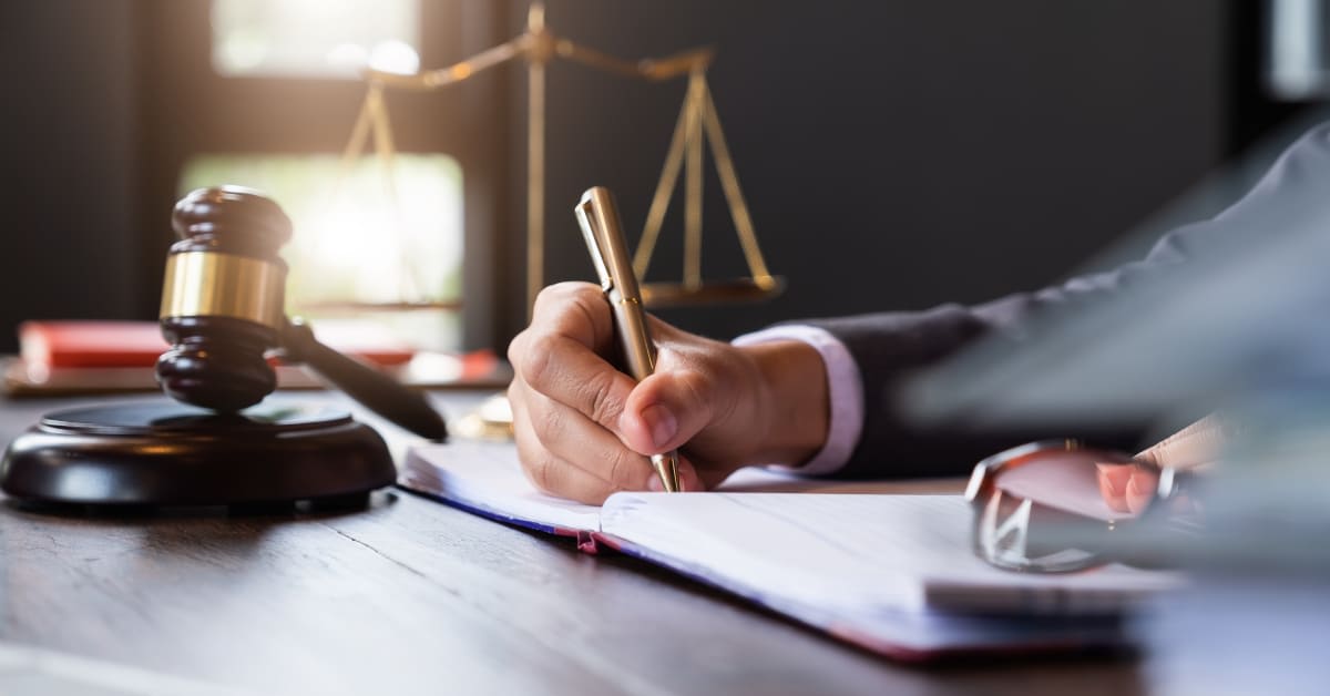 Vaccine exemption lawyer preparing legal documents for a religious or medical exemption request